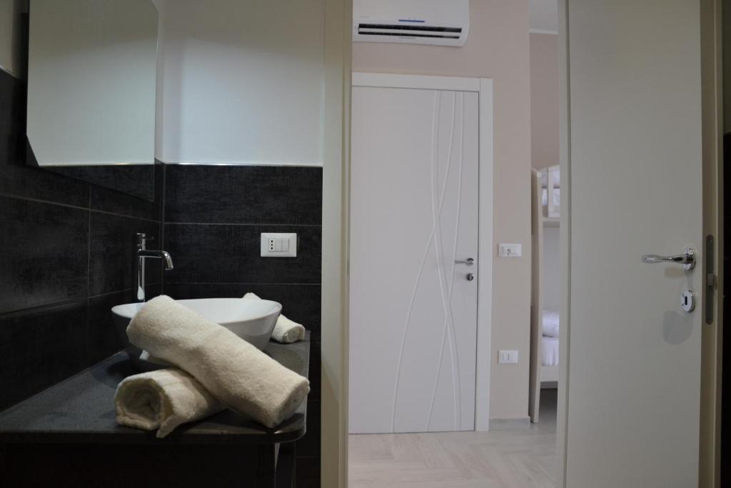 Postel nebo postele na pokoji v ubytování B&B Terra d'Oriente