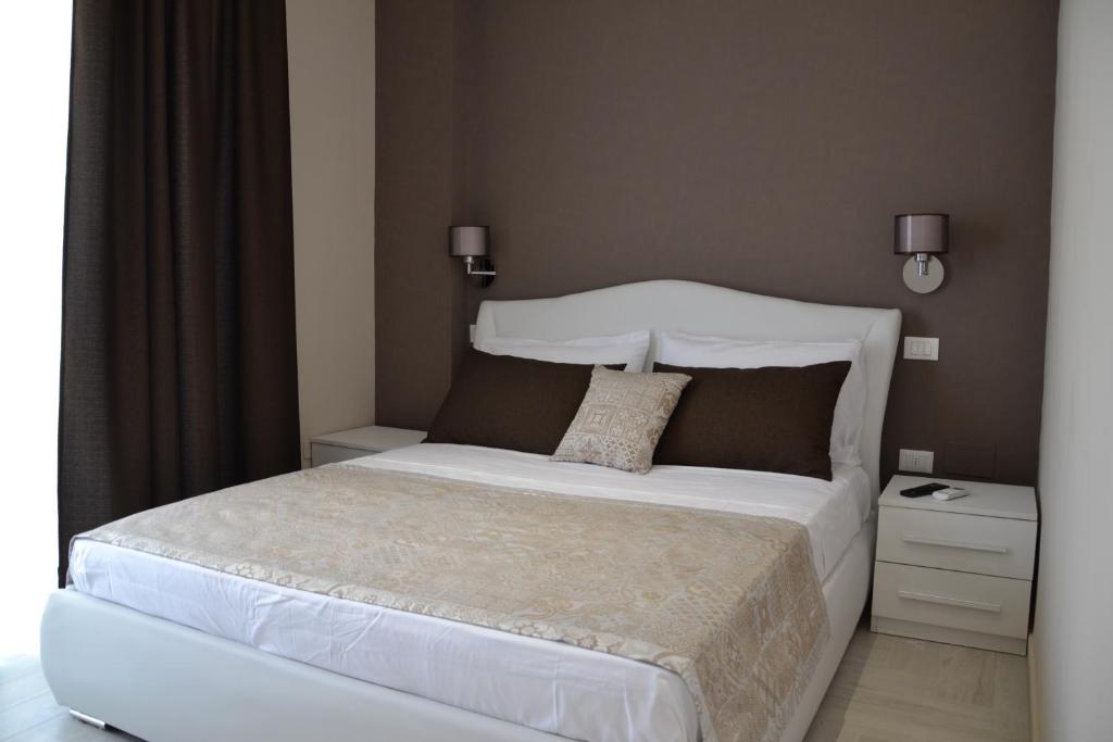 Postel nebo postele na pokoji v ubytování B&B Terra d'Oriente