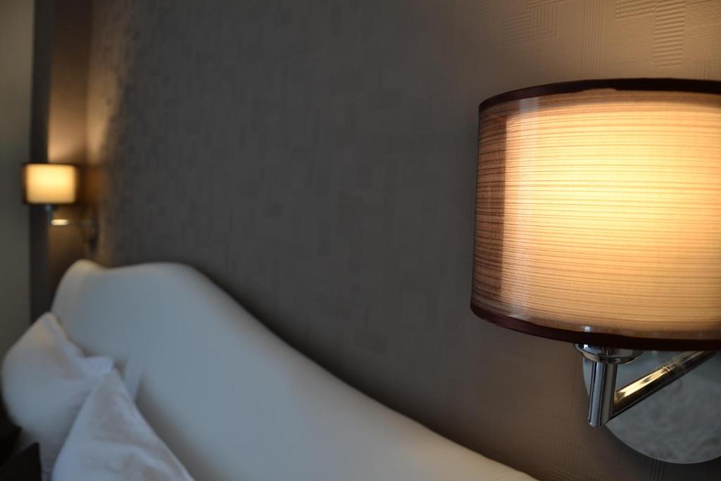 Postel nebo postele na pokoji v ubytování B&B Terra d'Oriente