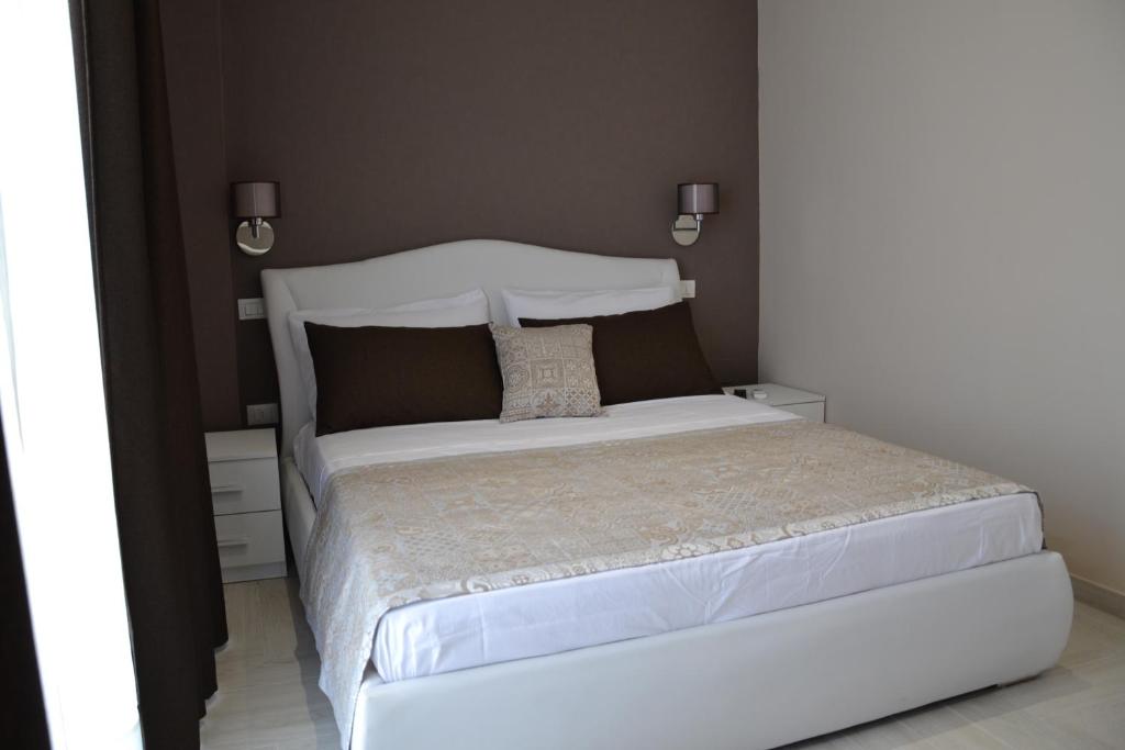 Postel nebo postele na pokoji v ubytování B&B Terra d'Oriente