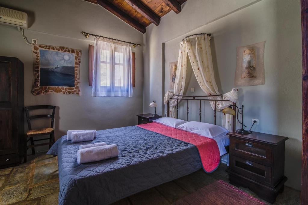Postel nebo postele na pokoji v ubytování Psamathous Guesthouse