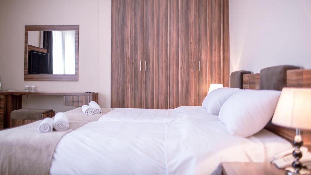 Postel nebo postele na pokoji v ubytování Hotel Semitronix
