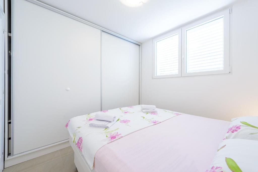 Postel nebo postele na pokoji v ubytování Apartment Sanja