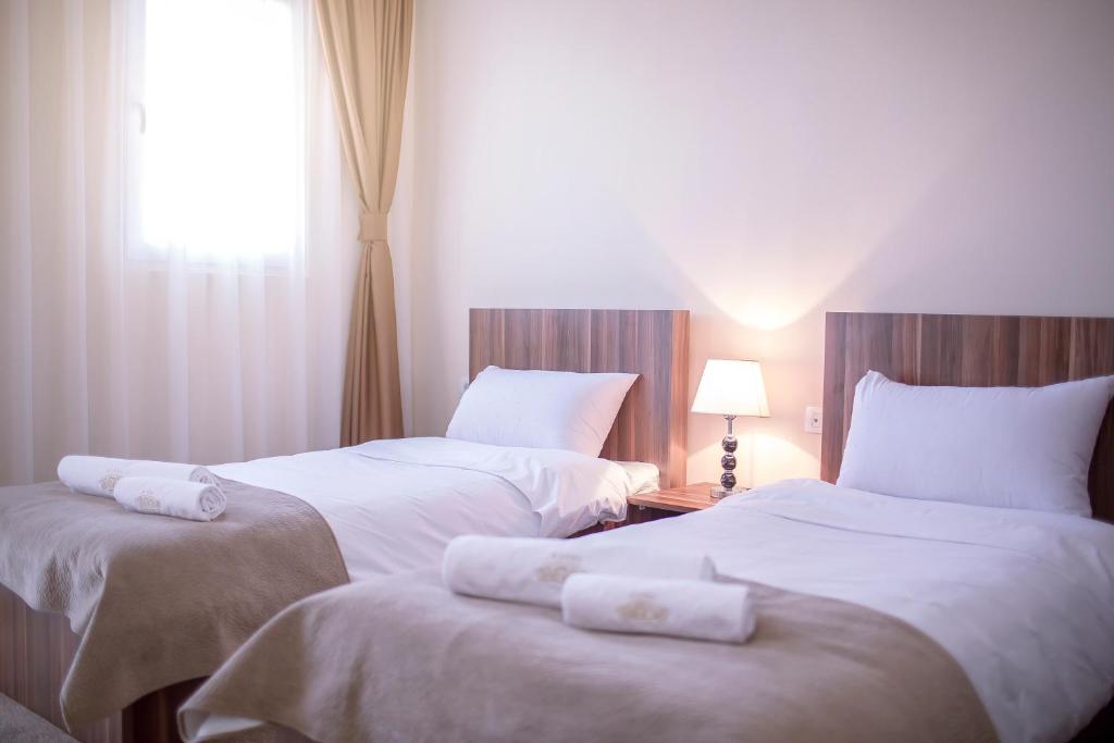 Postel nebo postele na pokoji v ubytování Hotel Semitronix