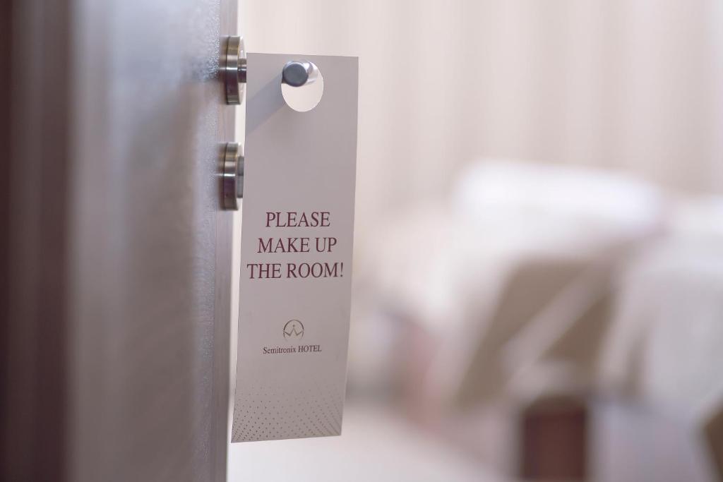 Postel nebo postele na pokoji v ubytování Hotel Semitronix