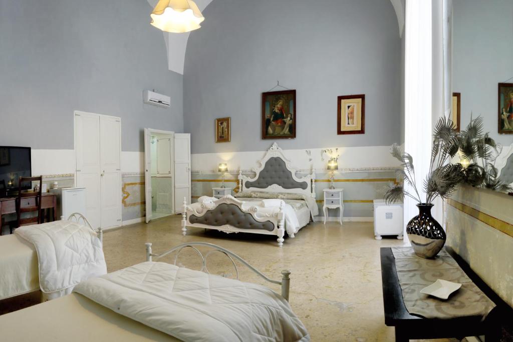 Posteľ alebo postele v izbe v ubytovaní B&B Dimora Muzio and Restaurant