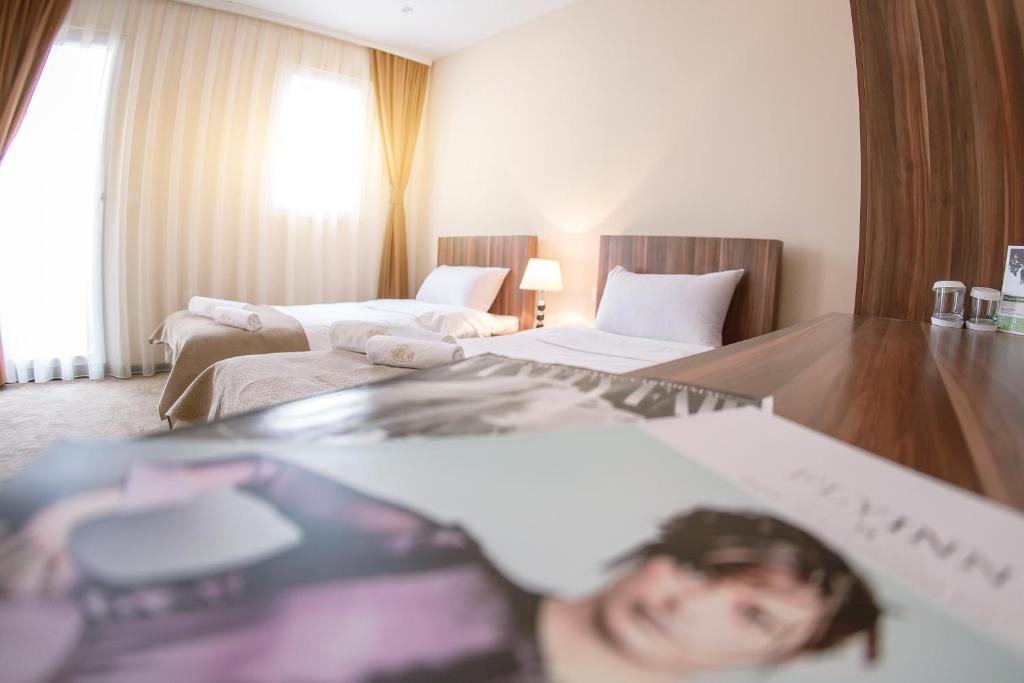Postel nebo postele na pokoji v ubytování Hotel Semitronix