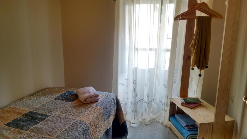 Postel nebo postele na pokoji v ubytování Casa fonte da pena