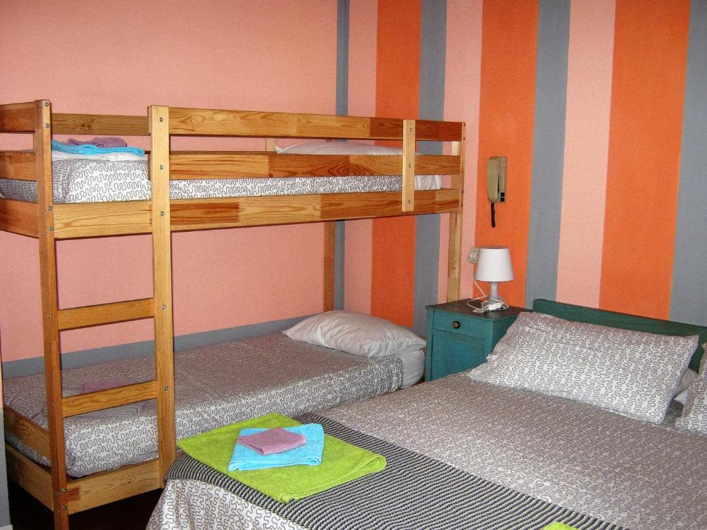 Postel nebo postele na pokoji v ubytování Albergo Sangalli