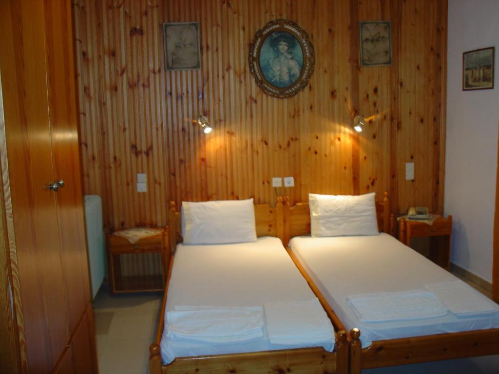 Postel nebo postele na pokoji v ubytování Zozas Rooms