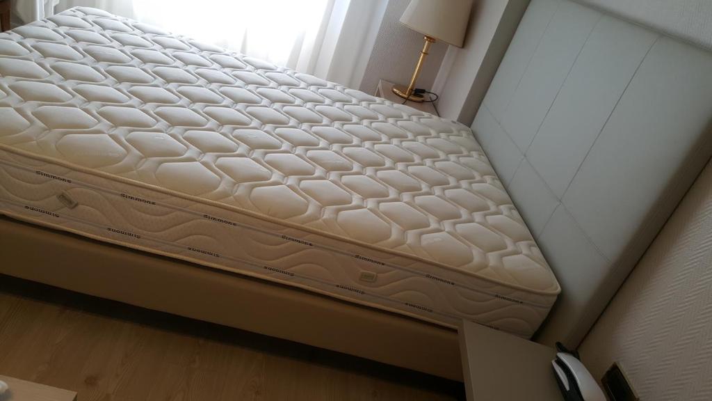 Postel nebo postele na pokoji v ubytování Hotel Augustus