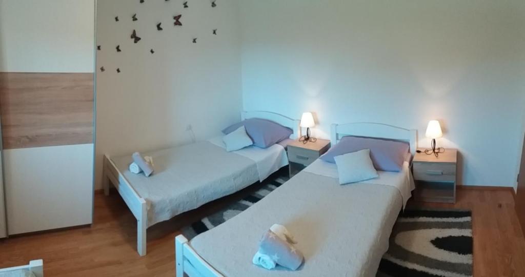 Posteľ alebo postele v izbe v ubytovaní Apartment M&M with private Pool