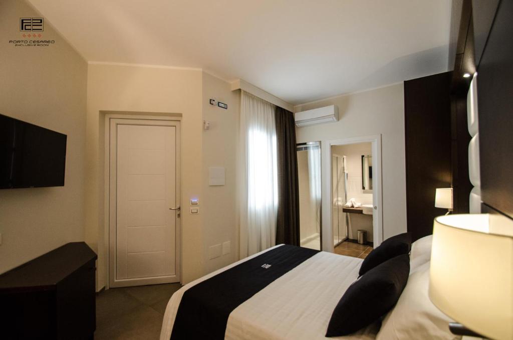 TV a/nebo společenská místnost v ubytování Porto Cesareo Exclusive Room