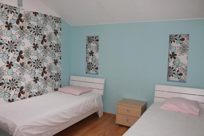 Postel nebo postele na pokoji v ubytování Europe Guesthouse