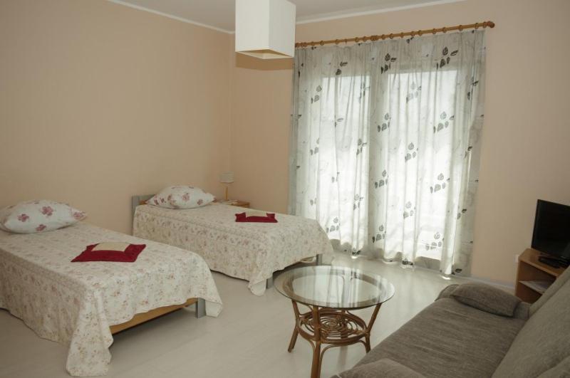 Postel nebo postele na pokoji v ubytování Europe Guesthouse