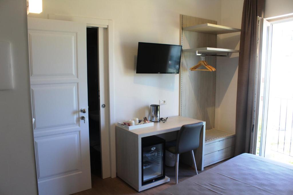 Televízia a/alebo spoločenská miestnosť v ubytovaní I Cordari B&B