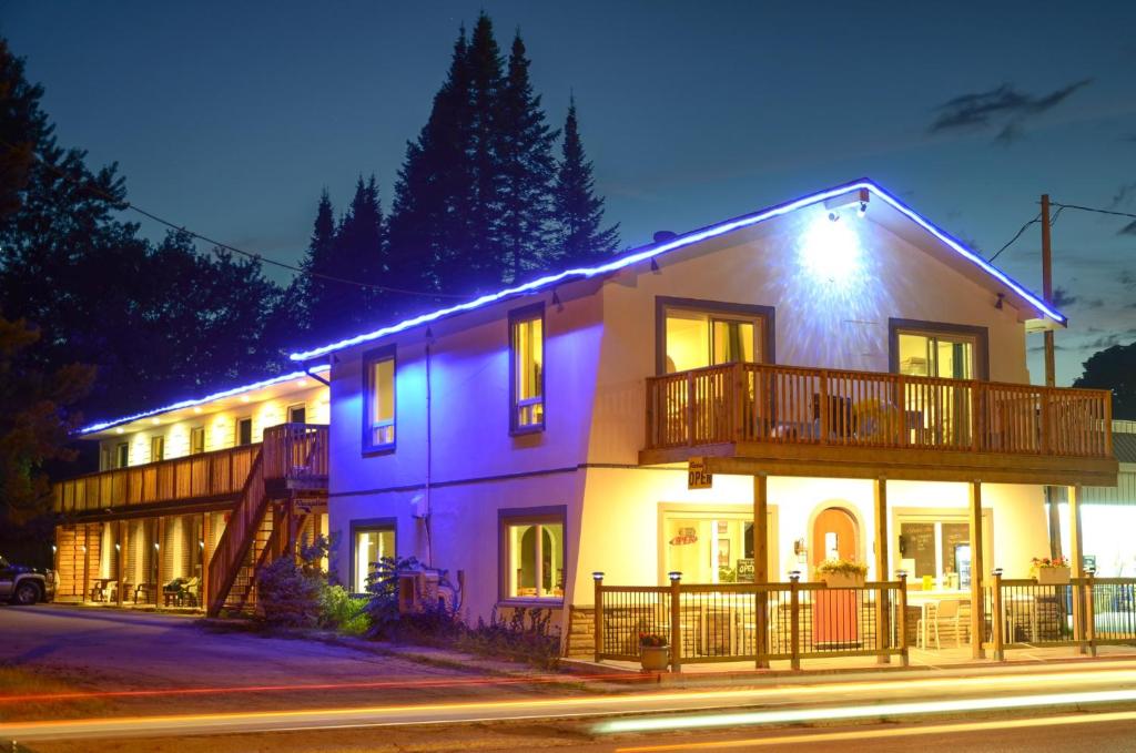 a large house with a balcony on the side of it at Meaford Inn in Meaford