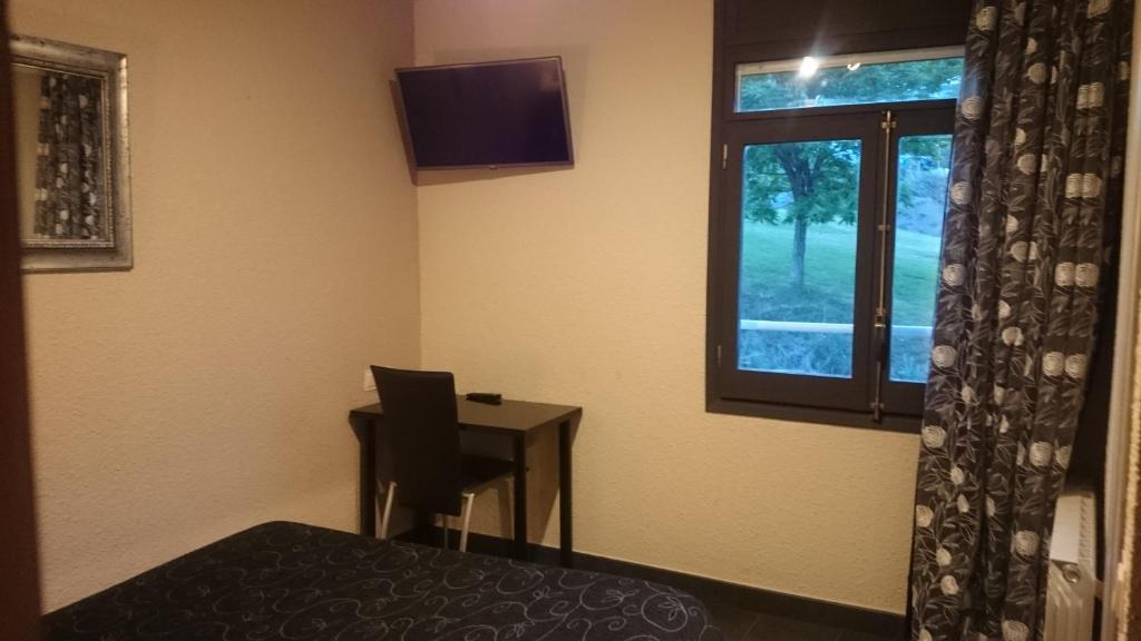 TV a/nebo společenská místnost v ubytování Fonda Matía