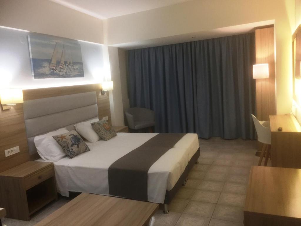 Posteľ alebo postele v izbe v ubytovaní Aristo Apts