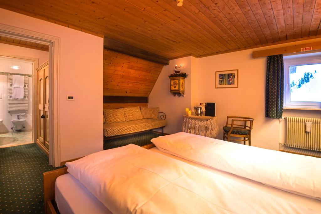 Postel nebo postele na pokoji v ubytování Hotel Cir