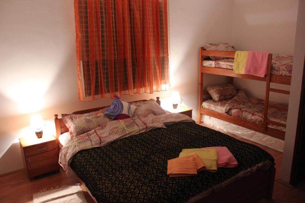 Postel nebo postele na pokoji v ubytování Stara Planina Vila Vesela kuca