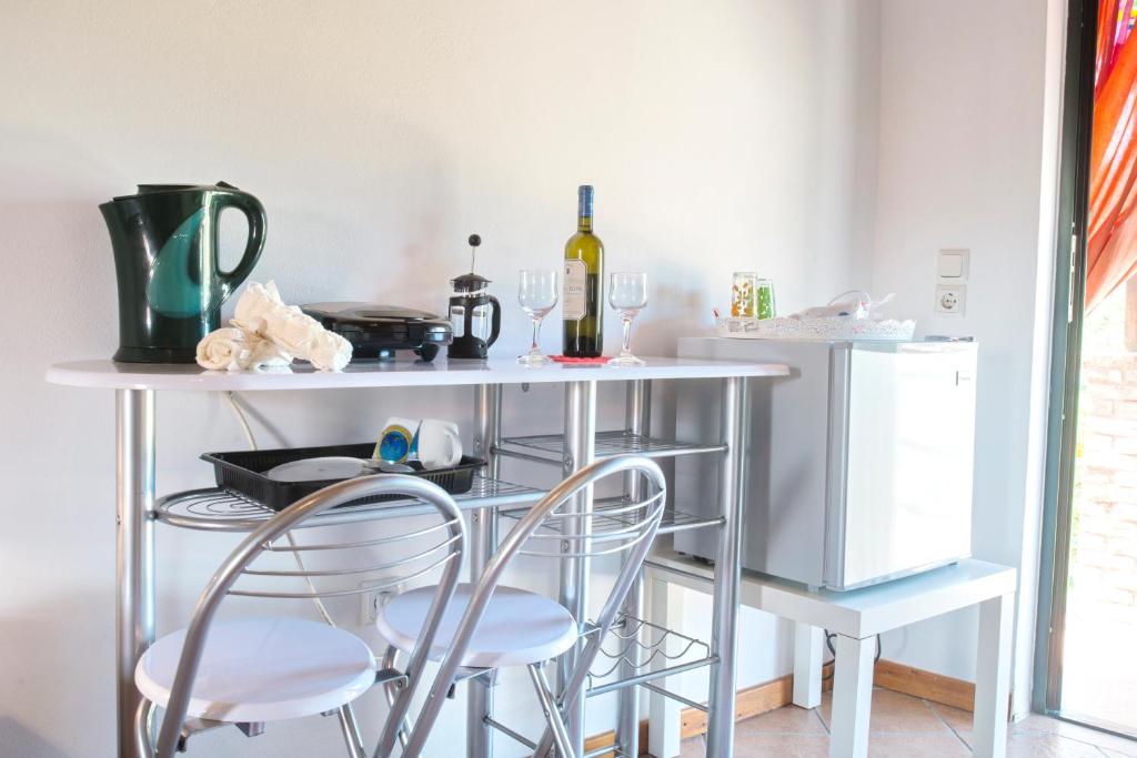 Kuchyň nebo kuchyňský kout v ubytování Nandia Studio & Apartment