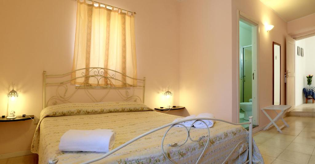 Posteľ alebo postele v izbe v ubytovaní B&B Dimora Muzio and Restaurant