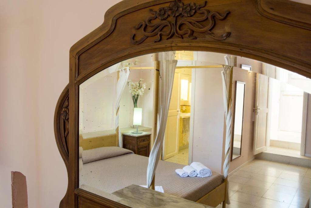 Posteľ alebo postele v izbe v ubytovaní B&B Dimora Muzio and Restaurant