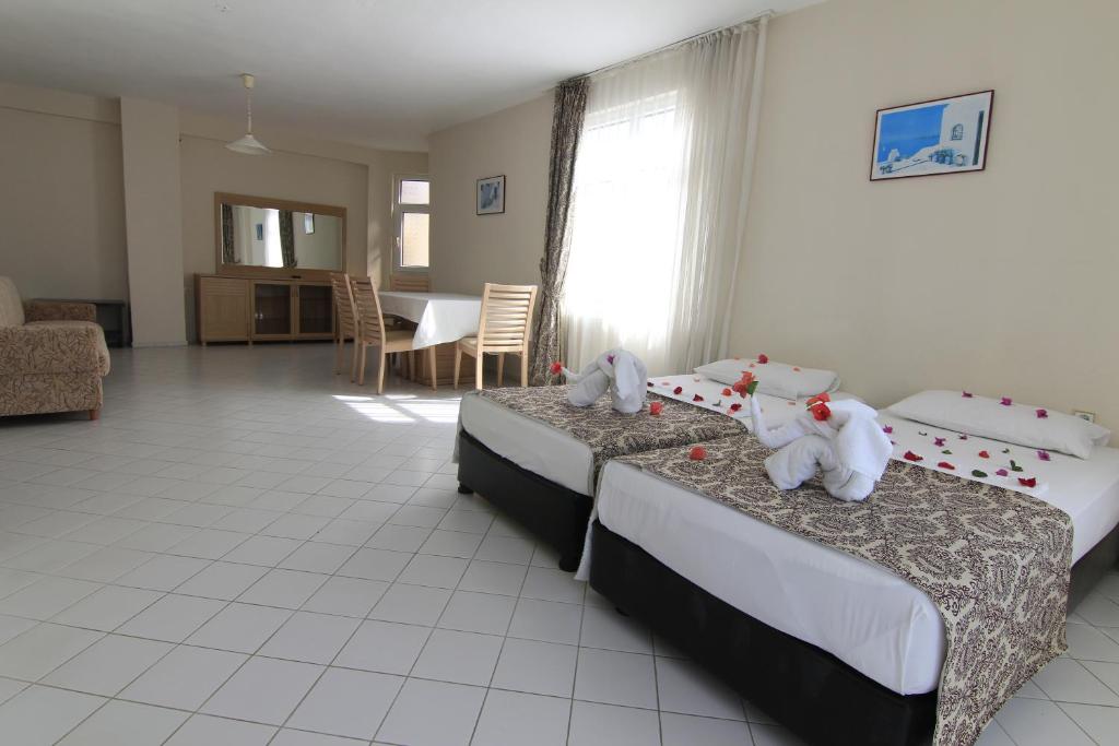 Postel nebo postele na pokoji v ubytování Bariscan Hotel