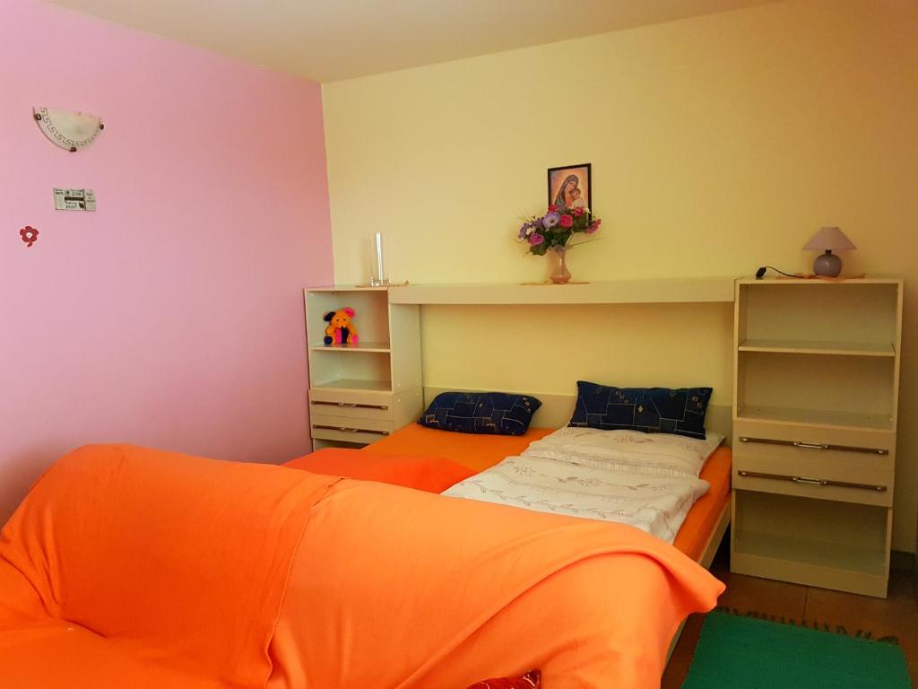 Postel nebo postele na pokoji v ubytování Penzion Termál