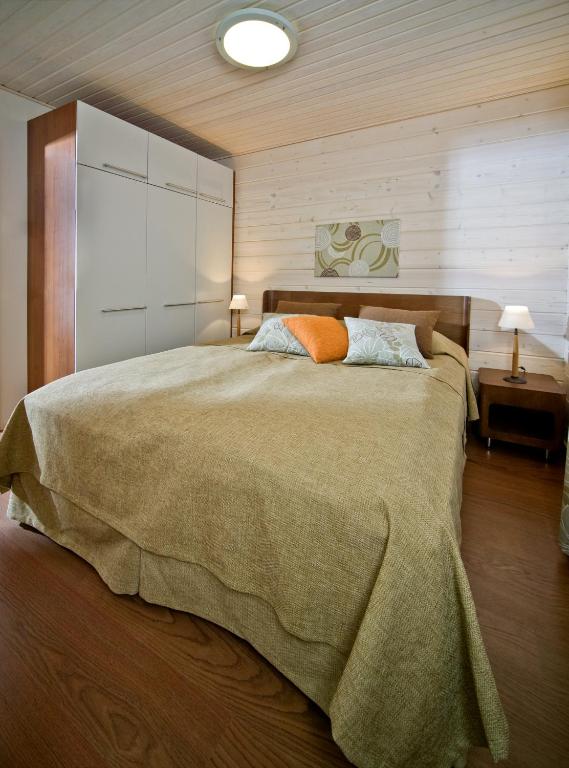 Кровать или кровати в номере Holiday Club Salla Apartments