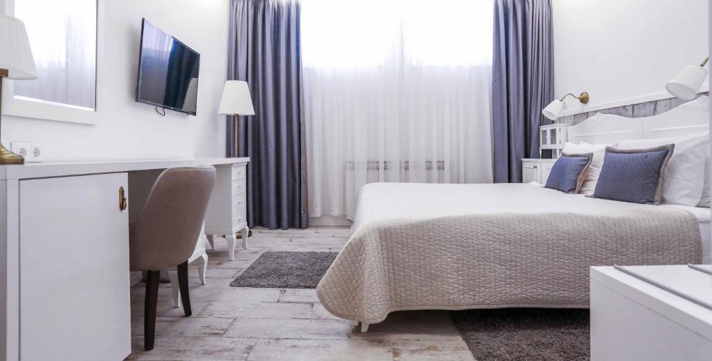 Postel nebo postele na pokoji v ubytování Hotel Divan