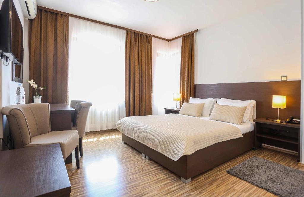 Postel nebo postele na pokoji v ubytování Hotel Divan