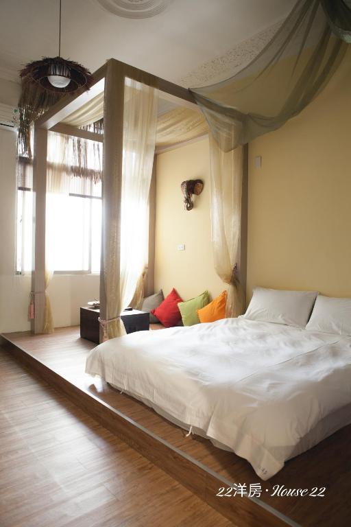 Postel nebo postele na pokoji v ubytování House 22