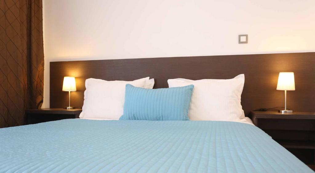 Postel nebo postele na pokoji v ubytování Hotel Divan