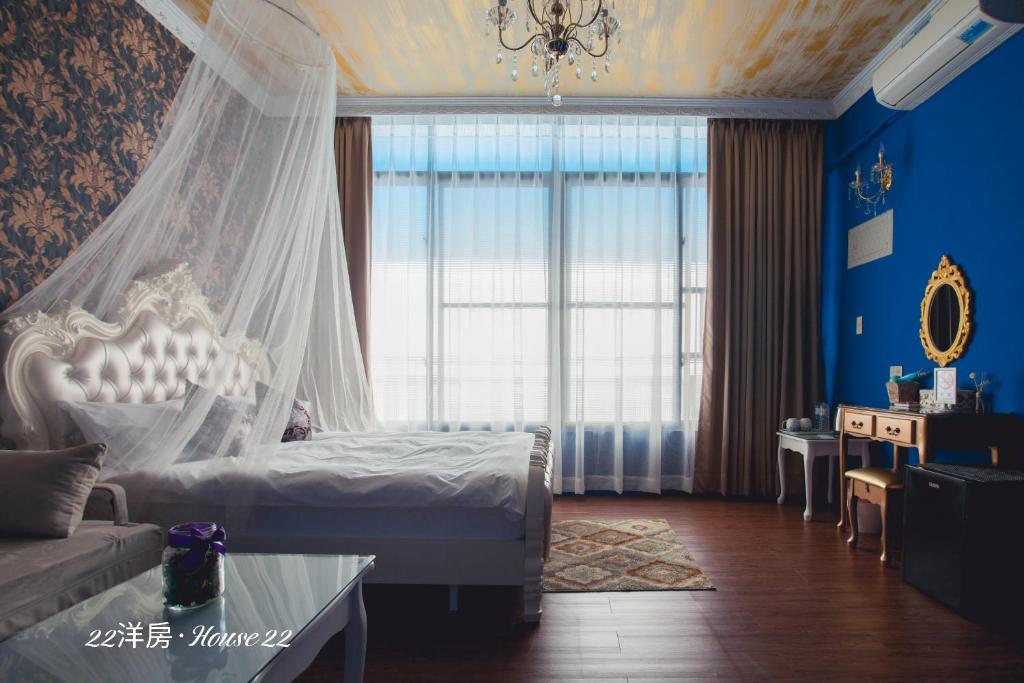 Postel nebo postele na pokoji v ubytování House 22