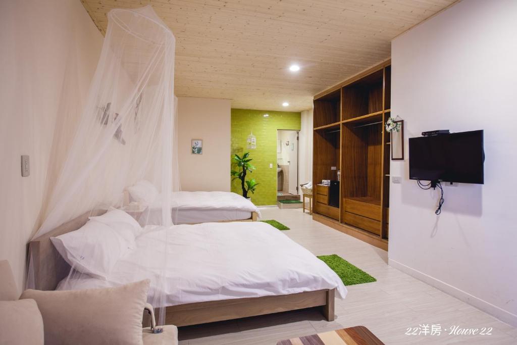 Postel nebo postele na pokoji v ubytování House 22