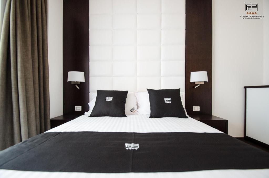 Postel nebo postele na pokoji v ubytování Porto Cesareo Exclusive Room