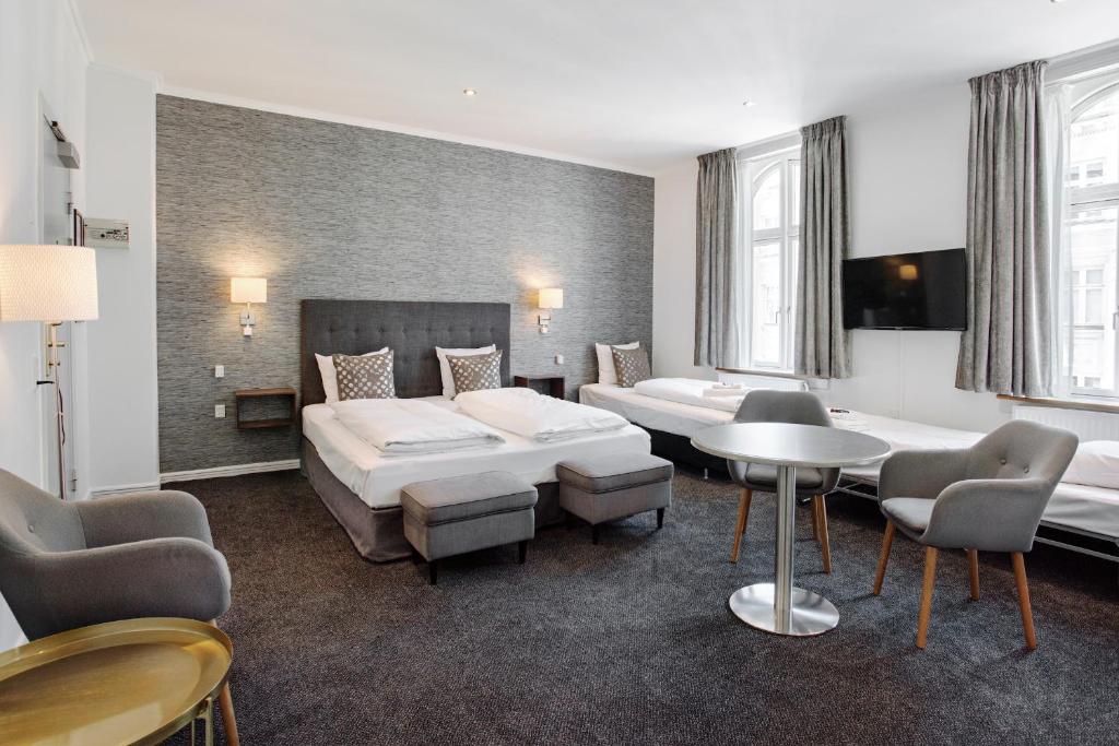 Postel nebo postele na pokoji v ubytování Hotel Tiffany