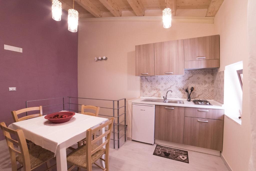 Kuchnia lub aneks kuchenny w obiekcie Aura Ortigia Apartments