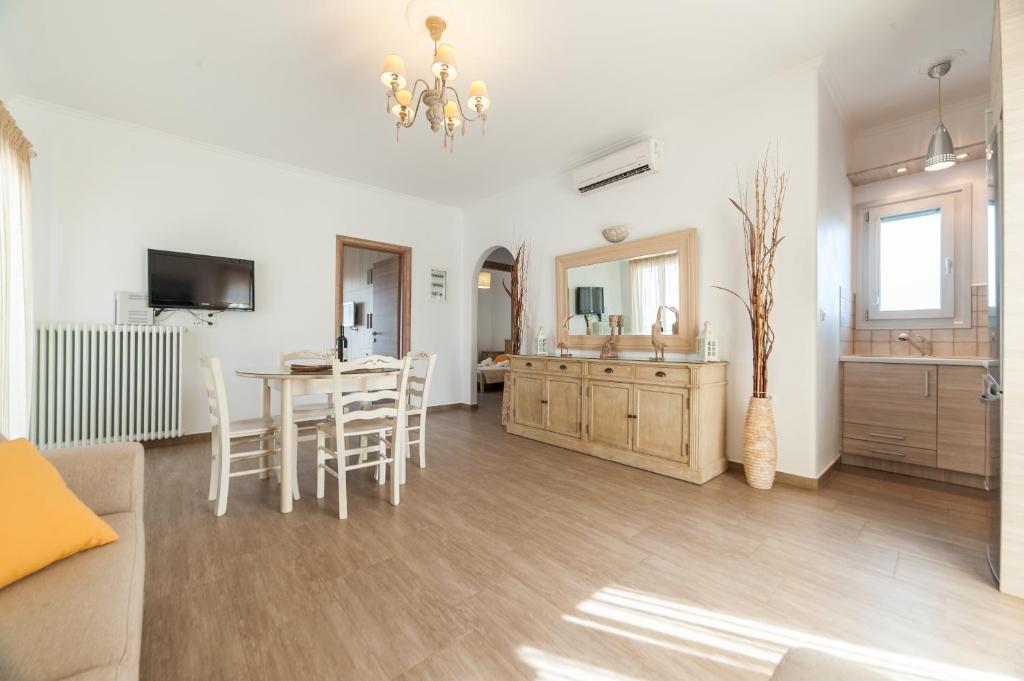 A television and/or entertainment centre at Panos Apartment Naousa