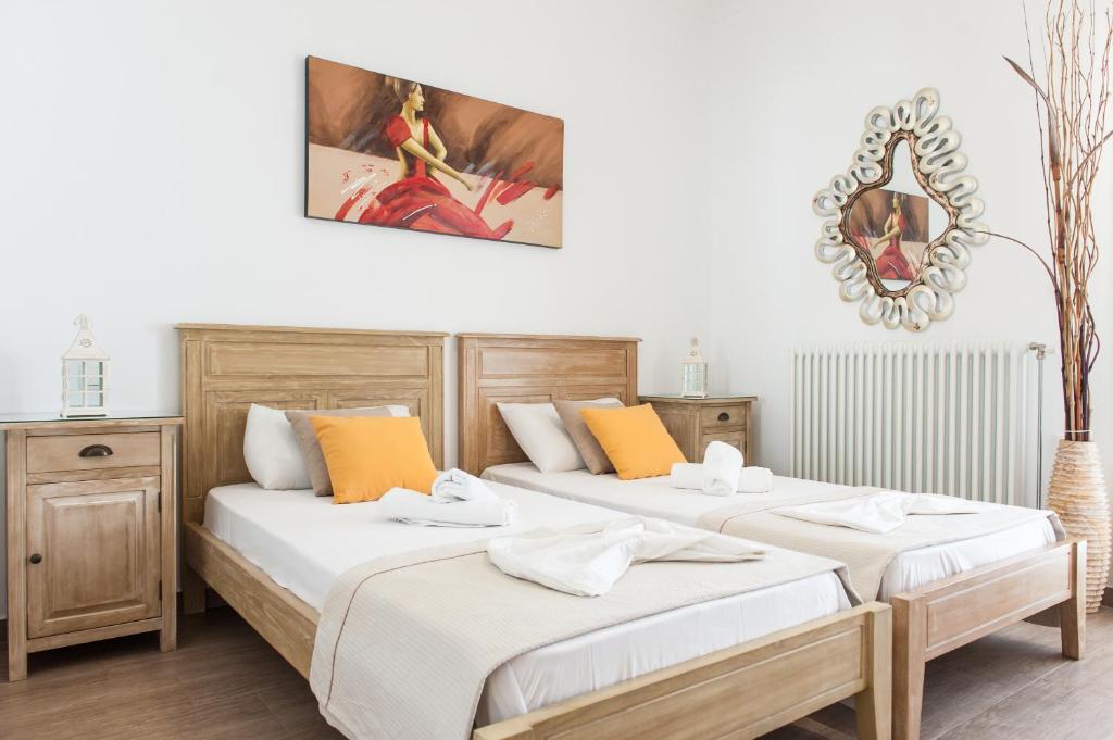 A bed or beds in a room at Panos Apartment Naousa