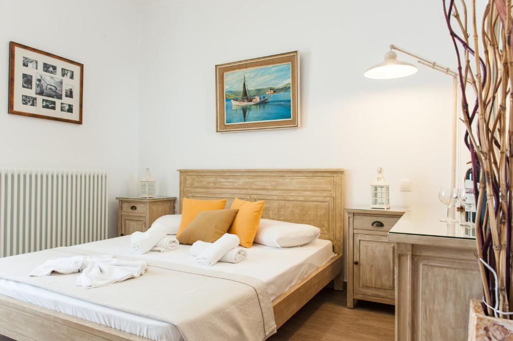 A bed or beds in a room at Panos Apartment Naousa