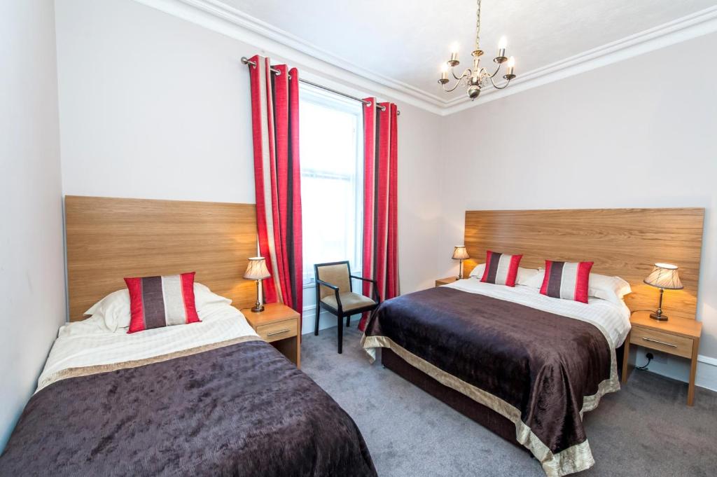 Postel nebo postele na pokoji v ubytování Belvedere Guest House