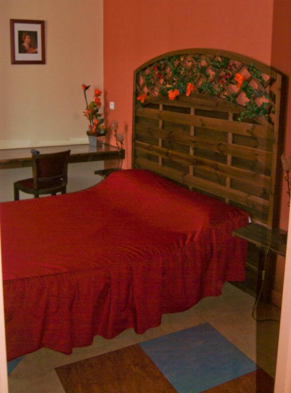 Postel nebo postele na pokoji v ubytování Hôtel Bertrand