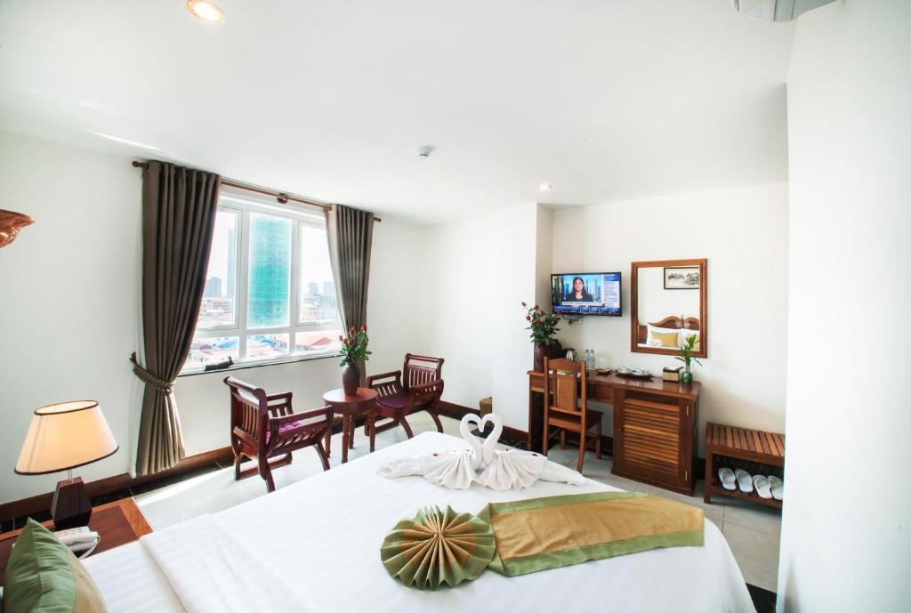 TV a/nebo společenská místnost v ubytování Relax Hotel