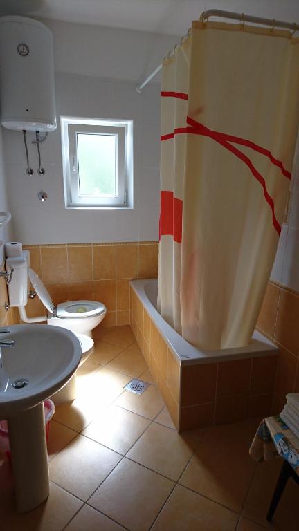 Koupelna v ubytování Apartments Anastazija