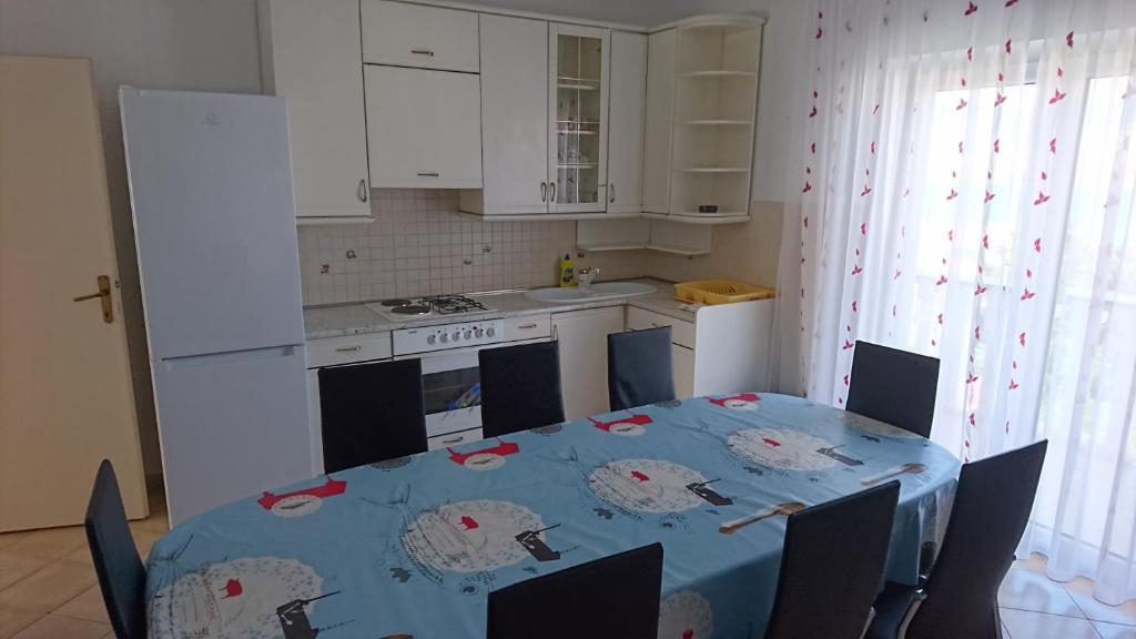 Kuchyň nebo kuchyňský kout v ubytování Apartments Anastazija