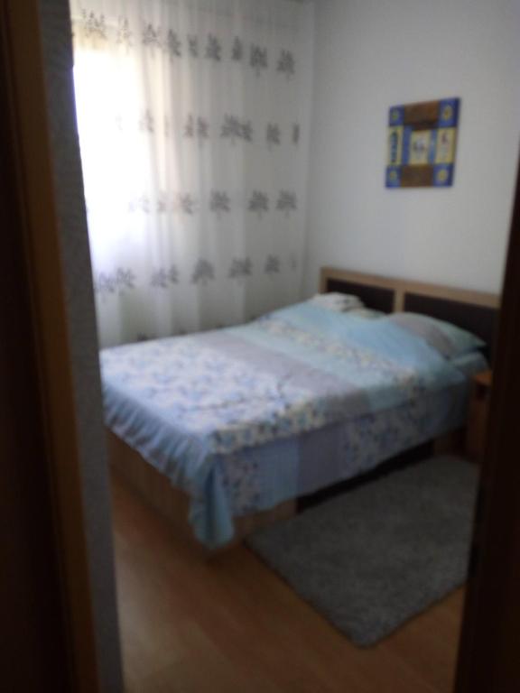 Postel nebo postele na pokoji v ubytování Pensiunea Vladut Timisoara