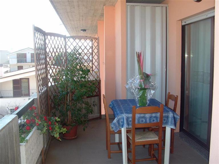 a balcony with a table and chairs on a balcony at Bed & Breakfast Oasi in Pescara